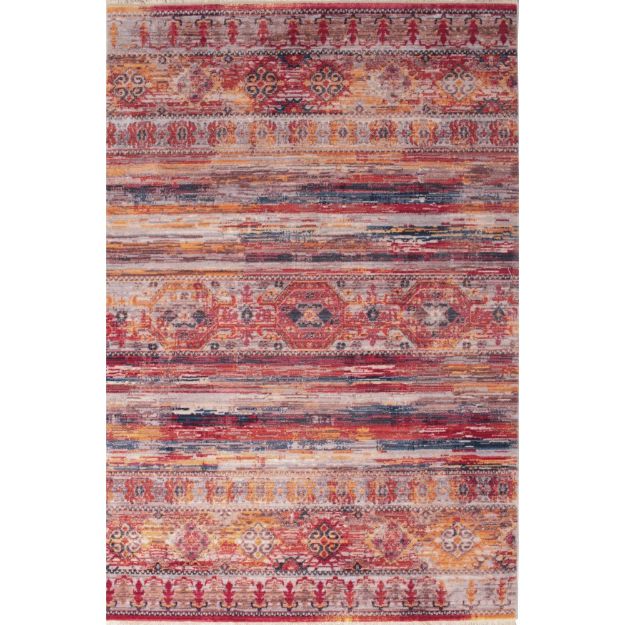 Vibrant rug with a traditional-inspired design featuring bold red, orange, and blue hues accented with intricate geometric patterns