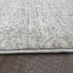 Luxurious shimmer striped rug with subtle pattern, perfect for modern interior design.