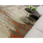 Pacific Orange Gray Abstract Rug featuring premium synthetic fibers, offering superior stain resistance and an elegant modern design for versatile spaces.