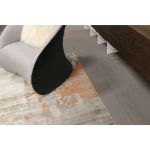 Pacific Orange Gray Abstract Rug featuring premium synthetic fibers, offering superior stain resistance and an elegant modern design for versatile spaces.