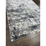 Exquisite Gray and Blue Abstract Rug with modern design, featuring a textured hi-low dense pile and a blend of gray and blue tones, ideal for contemporary home décor.