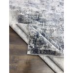 Exquisite Gray and Blue Abstract Rug with modern design, featuring a textured hi-low dense pile and a blend of gray and blue tones, ideal for contemporary home décor.