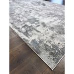 Exquisite Silver and Gray Abstract Rug with a modern design, featuring a textured hi-low dense pile and elegant silver and gray tones, perfect for contemporary home décor.