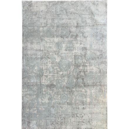 1.	Elegant silver and gray Oushak rug with a high-low pile texture showcasing timeless beauty.