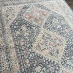 High-quality blue diamond trellis rug with soft polyester pile and cotton backing ideal for adding warmth and style to any living space