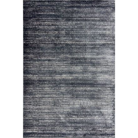 Unity Charcoal Blue short pile rug with a sleek minimalist design on hardwood flooring