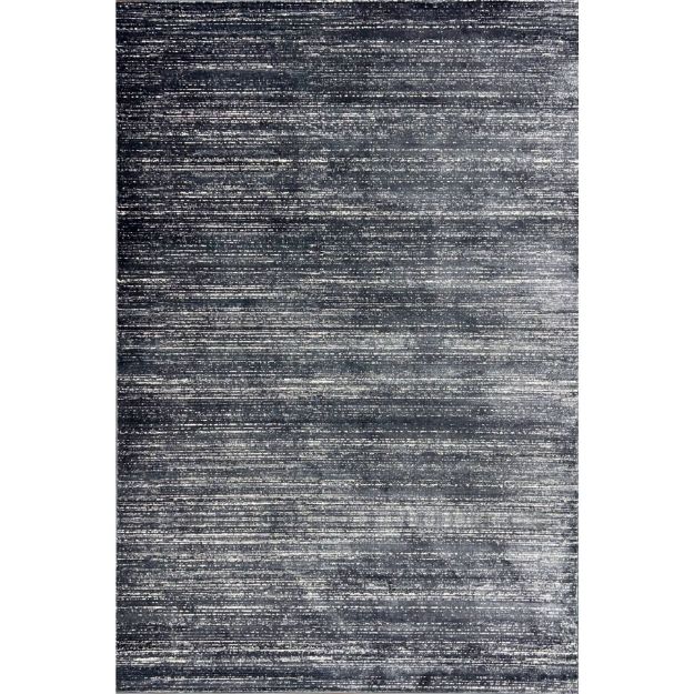 Unity Charcoal Blue short pile rug with a sleek minimalist design on hardwood flooring