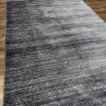 Stylish and modern Unity Charcoal Blue area rug ideal for high-traffic living spaces