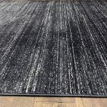 Close-up of Unity Charcoal Blue rug showcasing its elegant short pile and premium craftsmanship