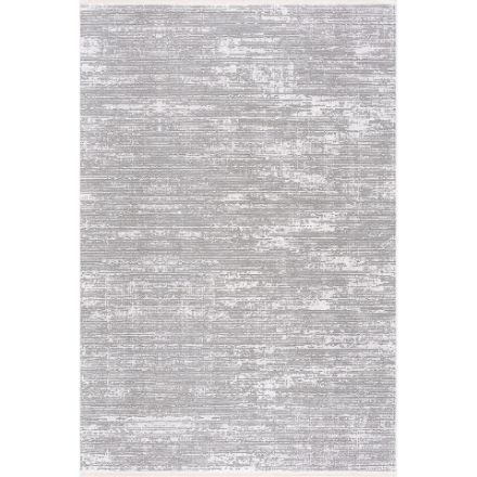 Smyrna subtle-textured rug with minimalist patterns in muted gray, silver, and white tones for elegant home decor