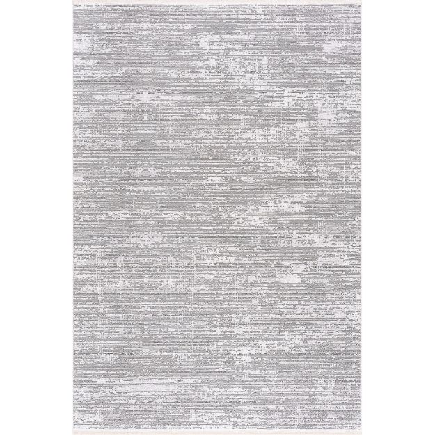 Smyrna subtle-textured rug with minimalist patterns in muted gray, silver, and white tones for elegant home decor