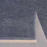 Close-Up of Smyrna Collection Rug Featuring Detailed Woven Patterns in deep blue and fringes