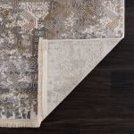 Premium-quality Smyrna collection rug with a unique water flow-inspired pattern in gold and blue hues