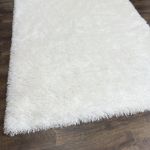 Plush and Resilient White Rug with High-Density Knot Construction