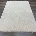 Plush and Resilient Ivory Off-White Rug with High-Density Knot Construction for Longevity