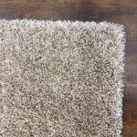 Thick and Comfortable Beige Rug Designed for Cozy, Sophisticated Interiors