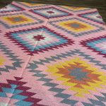 Pink and colorful Turkish wool rug for loft or industrial-style home interiors