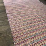 Wool flat-weave Turkish area rug with vibrant stripes, ideal for eclectic or industrial spaces