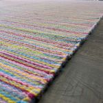 Lightweight Turkish flatwoven rug with bright colors and striped patterns for loft interiors