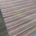 Durable wool Turkish kilim rug with vibrant bohemian striped motifs for living rooms or bedrooms