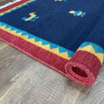 Picture of 3'2"x6'4" Handmade Wool Kilim Rug – Navy Blue Flat-Weave with Folk Bird and Figure Motif