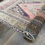Picture of 3'8" x 6'1" Vintage Turkish Rug | Handmade Wool Rug with Medallion | Pink and Navy Living Room Rug