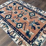 Picture of Handmade 4'3"x6'4" Turkish Rug – Terracotta and Blue Floral Design, Unique Boho Area Rug