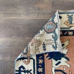 Picture of Handmade 4'3"x6'4" Turkish Rug – Terracotta and Blue Floral Design, Unique Boho Area Rug